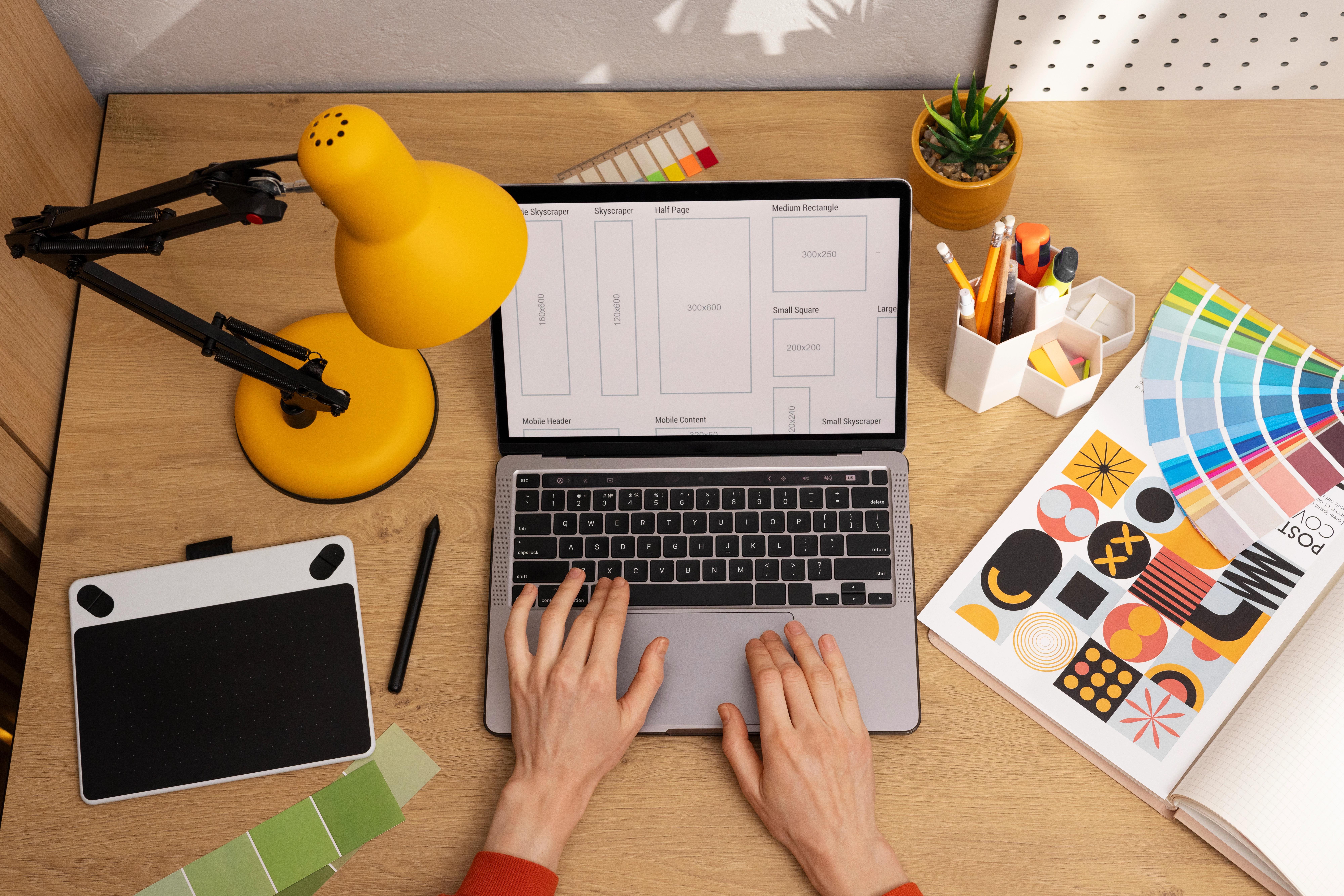 Design management with team reviewing BOM drawings and plans